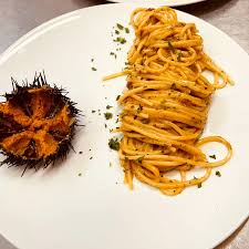 Ristorante Il Riccio signature dishes Fettuccelle Di Farro
Spaghettoni Ai Ricci Di Mare
Scampi